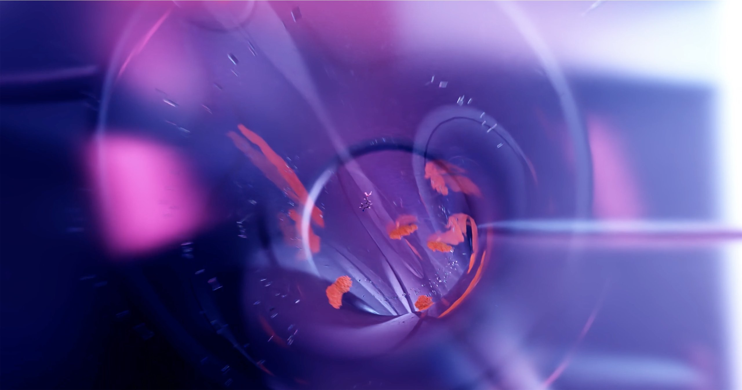 Proteins flowing through tube in purple shown in 3D animation.jpg